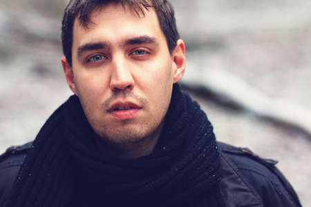 Attractive young man walking outdoorsの写真素材