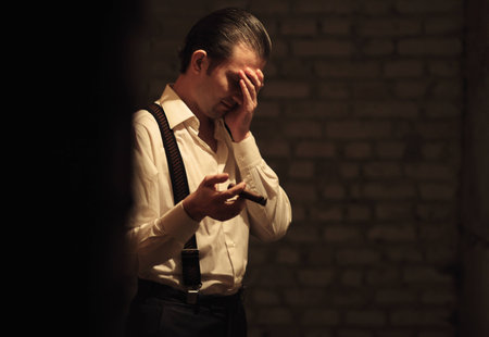 Portrait of young gangster with cigarの写真素材