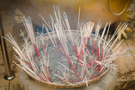 Joss stick on joss stick pot with smoke use for praying to the Buddha