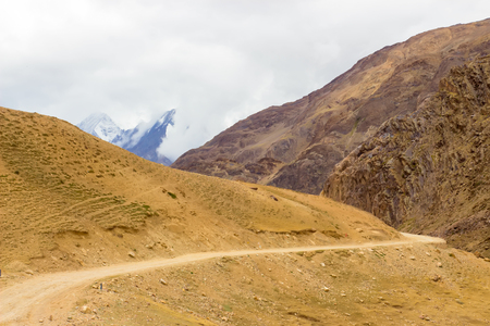 The road between the mountains leads to Spiti Valley. Himachal Pradesh.の写真素材