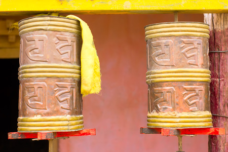 Cylinders with Tibetan symbols in Sanskrit for meditationの写真素材
