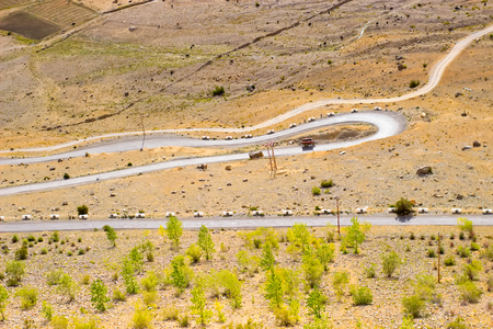 Serpentine road in the mountains of India in the valley of Spitiの写真素材