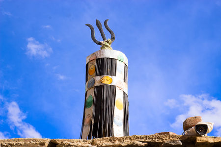 Shivas Shivas trident on the roof of temple. Religion spiritual concept.の写真素材