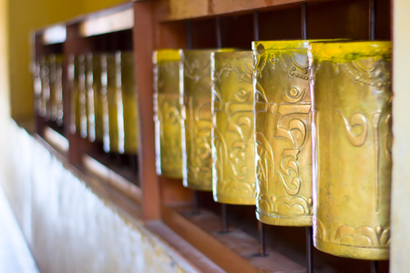 Cylinders line with Tibetan symbols of mantras for meditationの写真素材