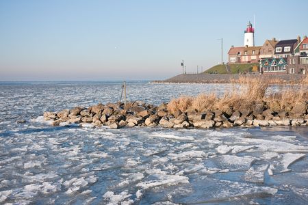 Dutch fishery village surrounded by iceの写真素材