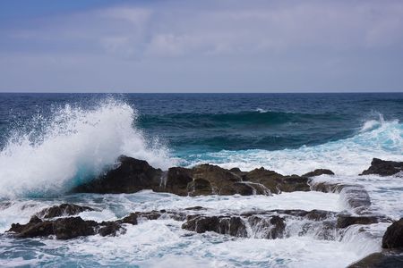 Waves breaking at the rocky coast of La Palma, Canary Islands, Spain