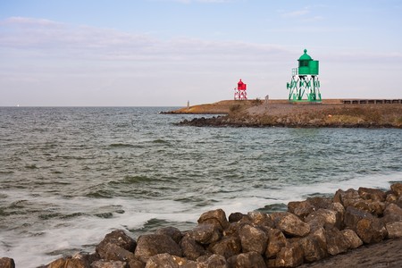 Entrance with lighthouses  at the harbor of Stavoren  in the Netherlandsの写真素材