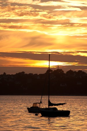 Sunset along the beautiful french coast of Bretagneの写真素材
