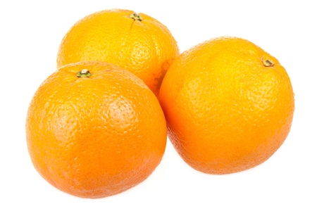 Three beautiful fresh oranges isolated on whiteの写真素材