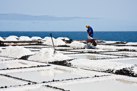 Worker at salt extraction La Palmaの写真素材