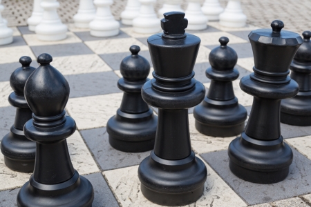 Outdoor chess board with big  plastic piecesの写真素材