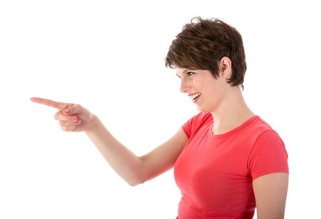 Pretty young woman pointing with her fingerの写真素材