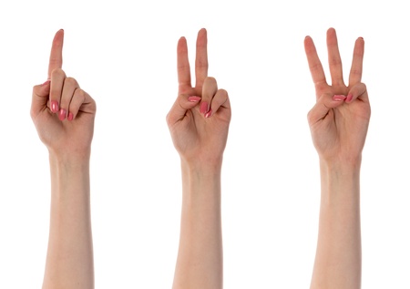 Three counting female hands isolated on white