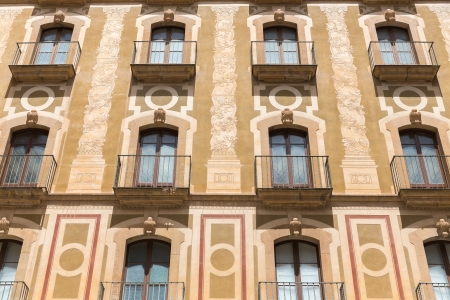 Facade of Santa Maria de Montserrat Monastery in Catalonia, Spainの写真素材