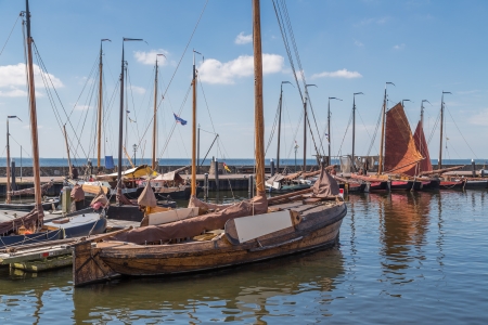 Dutch harbor of Urk with traditional wooden fishing boatsの写真素材