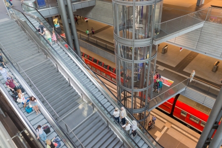 BERLIN, GERMANY - JULY 25  Tourists and workers are shopping and traveling at the central station of Berlin on July 25, 2013 in the central station of Berlin, Germanyのeditorial素材