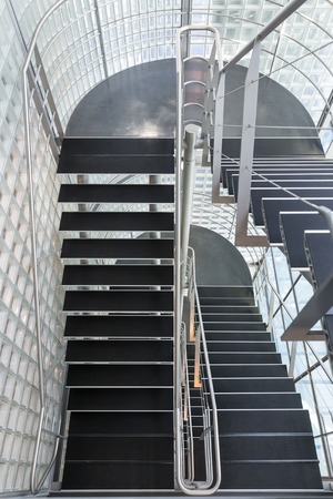 Steel stairway in a modern office buildingの写真素材