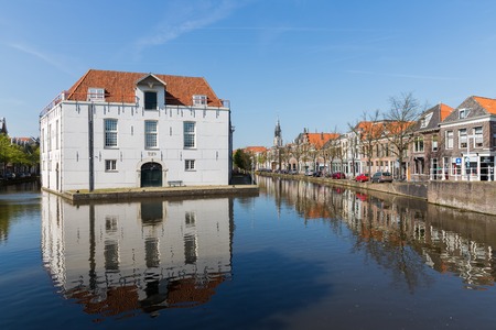 Cityscape of Delft with historic houses and army museum, the Netherlandsのeditorial素材