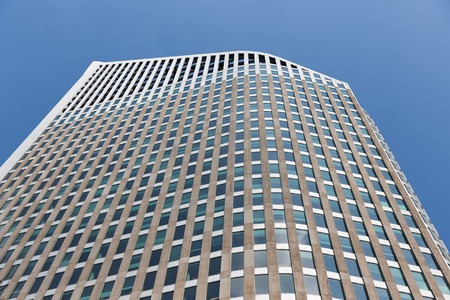 Facade of a modern skyscraper in the city of The Hague, The Netherlands