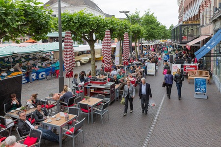 ZWOLLE, THE NETHERLANDS - MAY 30  People shopping and sitting at a terrace at a market on May 30, 2014 in the inner city of Zwolle, the Netherlandsのeditorial素材