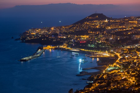 Aerial view of Funchal by night, Madeira Island, Portugalの写真素材