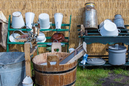 Traditional dutch farmer utensils with a washtub and buckets