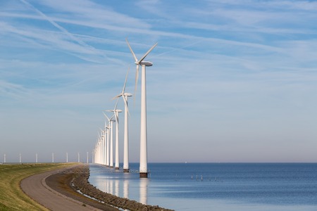 Long row off shore wind turbines along the Dutch coastの写真素材