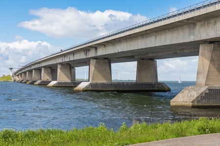 Big concrete bridge over Dutch lake near Lelystad