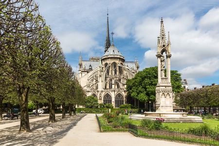PARIS FRANCE MAY 28: Tourists walking in the park around the Notre Dame cathedral on May 28 2015 in Paris Franceのeditorial素材