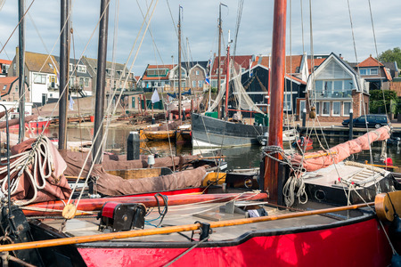 Historic wooden ships in harbor of Urk, an old Dutch fishing villageの写真素材