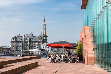 ANTWERP, BELGIUM - AUG 13: Terrace with unknown people near museum MAS on August 13, 2015 in the harbor of Antwerp, Belgiumのeditorial素材