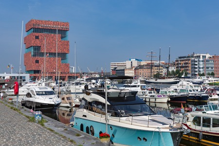 ANTWERP, BELGIUM - AUG 13: Marina harbor with yachts and sail boats near museum MAS on August 13, 2015 in the harbor of Antwerp, Belgiumのeditorial素材