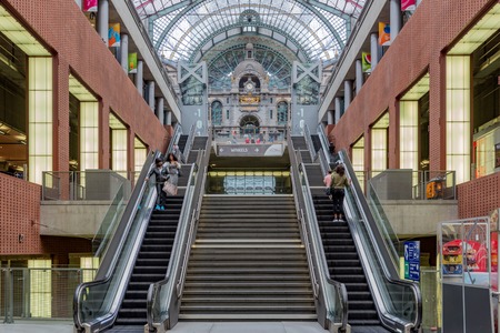 ANTWERP, BELGIUM - AUG 14: Staircase and escalators in famous renovated Antwerp central station on August 14, 2015 in Antwerp, Belgiumのeditorial素材