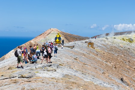 VULCANO, ITALY - MAY 24: Rescue helicopter and people at top of volcano on May 24, 2016 at Vulcano Island near Sicily, Italyのeditorial素材