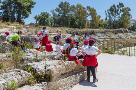 SIRACUSA ITALY - MAY 18: School pupils visiting the Greek theatre of Syracusa on May 18, 2016  at the island Sicily, Italyのeditorial素材