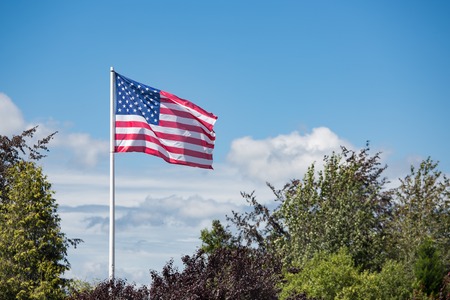 American flag Stars and Stripes at Bastogne WW2 Memorial in Belgian Ardennes