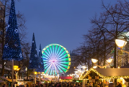 DUISBURG, GERMANY - DECEMBER 17, 2016: Traditional christmas market with illuminated ferris wheel in the center of Duisburg, Germanyのeditorial素材