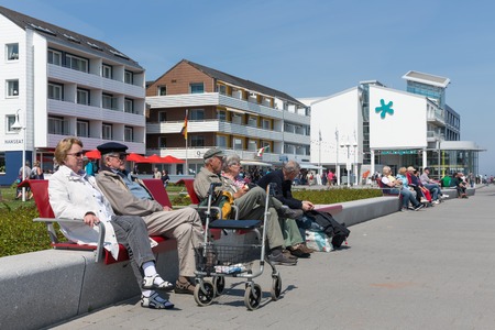 HELGOLAND, GERMANY - MAY 22, 2017: Relaxing older people at plaza near harbor of Helgolandのeditorial素材