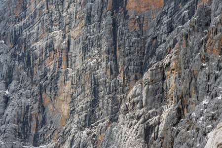 View at a vertical mountainside of Austrian Alps near Dachsteinの写真素材
