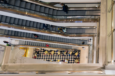 LONDON, ENGLAND - JUNE 09, 2017: Stairwell with shopping people in famous Selfridges department...