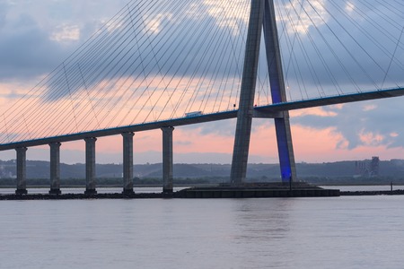 Sunrise view at Pont de Normandie, bridge over river Seine between Le Havre and Honfleur in France