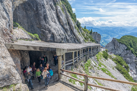 WERFEN, AUSTRIA - JULY 19, 2017: People walking at hiking trail through Austrian mountains near Werfen to ice cave Eisriesenweltのeditorial素材