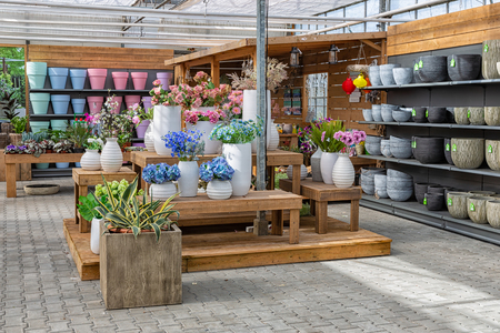 Marknesse The Netherlands - April 07: Modern garden shop selling flowers and accessories like pots and other plant decorationのeditorial素材