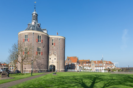 Enkhuizen, The Netherlands - April 20, 2018: Historic landmark Drommedaris at port of Enkhuizen, The Netherlandsのeditorial素材