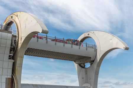 Falkirk, Scotland - May 19, 2018: Launch in Falkirk Wheel, rotating boat lift in Scotland which connects the Forth and Clyde Canal with the Union Canal.のeditorial素材