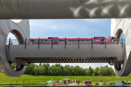 Falkirk, Scotland - May 19, 2018: Launch in Falkirk Wheel, rotating boat lift in Scotland, which connects the Forth and Clyde Canal with the Union Canal.のeditorial素材