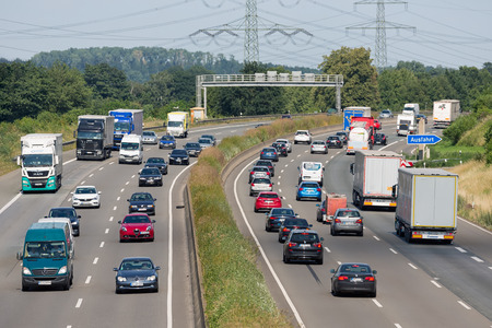 Eschweiler, Germany - June 28 2018: Highway with cars and trucs along german city Eschweiler and near Kolnのeditorial素材
