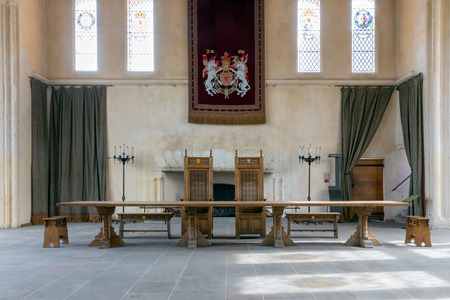 Stirling Castle, Scotland - May 19 2018: Medieval room of Stirling Castle with table, chairs and wall decorationsのeditorial素材