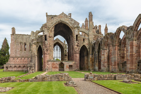 View at wall and ruins of Melrose abbey in Scottish bordersの写真素材
