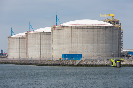 Rotterdam, The Netherlands - June 5, 2018: Oil storage tanks in Dutch harbor Rotterdam, biggest seaport of Europeのeditorial素材